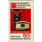 Telephone from 1905 and desk phone from 1977, exhibition log - Germany / Berlin 1977 - 50
